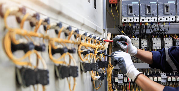 Professional Generator Installation technician working in Sackets Harbor, NY